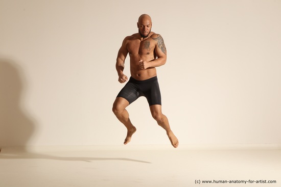 Underwear Gymnastic poses Man Black Muscular Bald Dancing Dynamic poses Academic