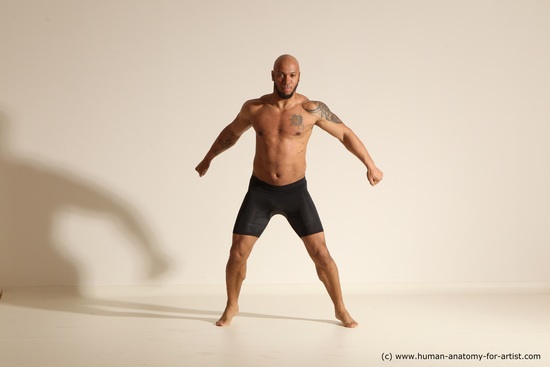 Underwear Gymnastic poses Man Black Muscular Bald Dancing Dynamic poses Academic