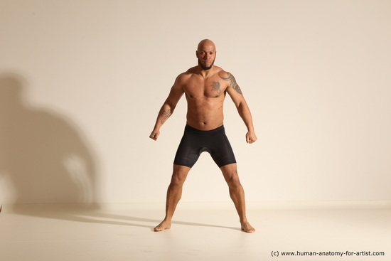 Underwear Gymnastic poses Man Black Muscular Bald Dancing Dynamic poses Academic