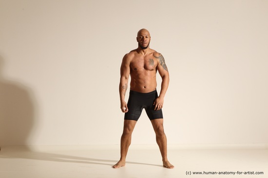 Underwear Gymnastic poses Man Black Muscular Bald Dancing Dynamic poses Academic