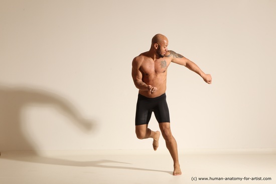 Underwear Gymnastic poses Man Black Muscular Bald Dancing Dynamic poses Academic