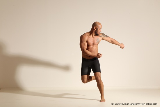 Underwear Gymnastic poses Man Black Muscular Bald Dancing Dynamic poses Academic