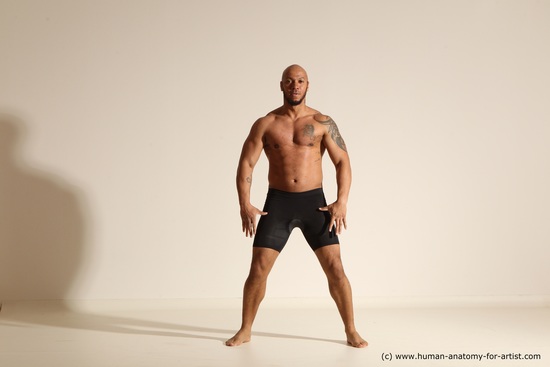 Underwear Gymnastic poses Man Black Muscular Bald Dancing Dynamic poses Academic