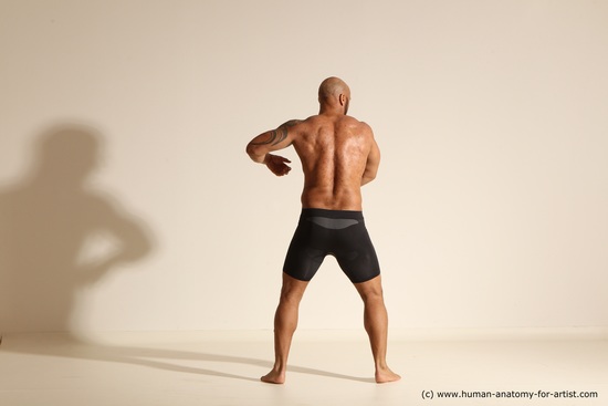 Underwear Gymnastic poses Man Black Muscular Bald Dancing Dynamic poses Academic