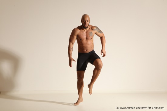 Underwear Gymnastic poses Man Black Muscular Bald Dancing Dynamic poses Academic