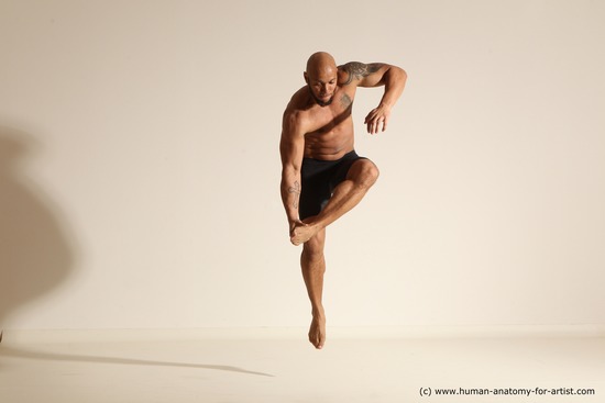 Underwear Gymnastic poses Man Black Muscular Bald Dancing Dynamic poses Academic