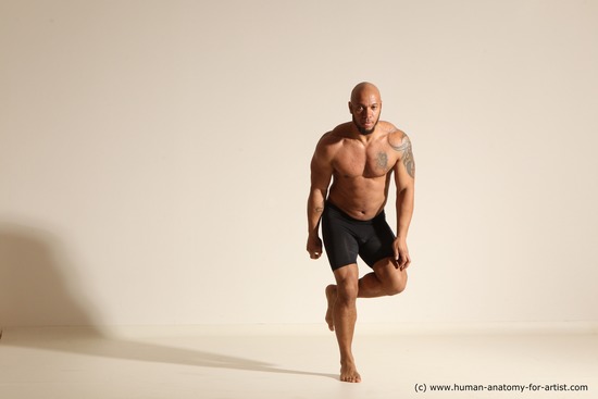 Underwear Gymnastic poses Man Black Muscular Bald Dancing Dynamic poses Academic