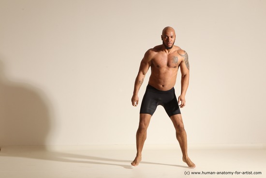 Underwear Gymnastic poses Man Black Muscular Bald Dancing Dynamic poses Academic