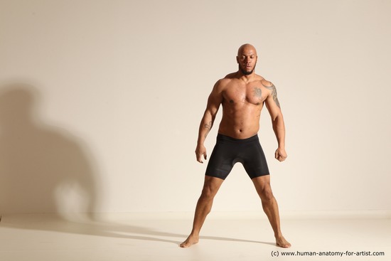 Underwear Gymnastic poses Man Black Muscular Bald Dancing Dynamic poses Academic