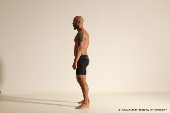 Underwear Gymnastic poses Man Black Muscular Bald Dancing Dynamic poses Academic