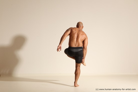 Underwear Gymnastic poses Man Black Muscular Bald Dancing Dynamic poses Academic