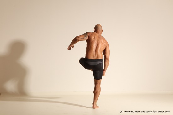 Underwear Gymnastic poses Man Black Muscular Bald Dancing Dynamic poses Academic