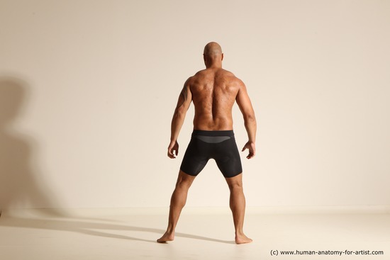 Underwear Gymnastic poses Man Black Muscular Bald Dancing Dynamic poses Academic