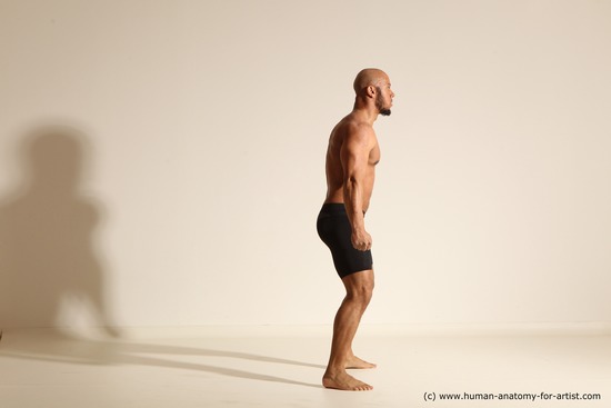 Underwear Gymnastic poses Man Black Muscular Bald Dancing Dynamic poses Academic