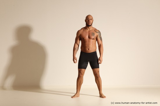 Underwear Gymnastic poses Man Black Muscular Bald Dancing Dynamic poses Academic