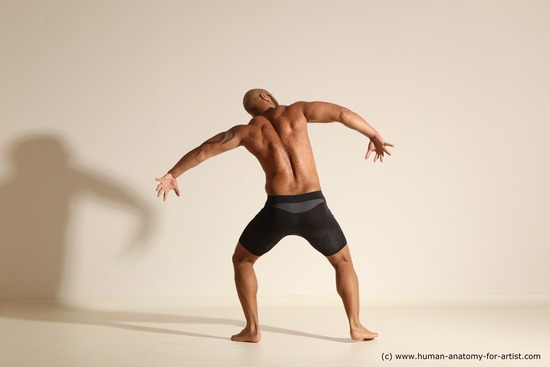 Underwear Gymnastic poses Man Black Muscular Bald Dancing Dynamic poses Academic