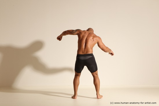 Underwear Gymnastic poses Man Black Muscular Bald Dancing Dynamic poses Academic