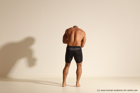 Underwear Gymnastic poses Man Black Muscular Bald Dancing Dynamic poses Academic