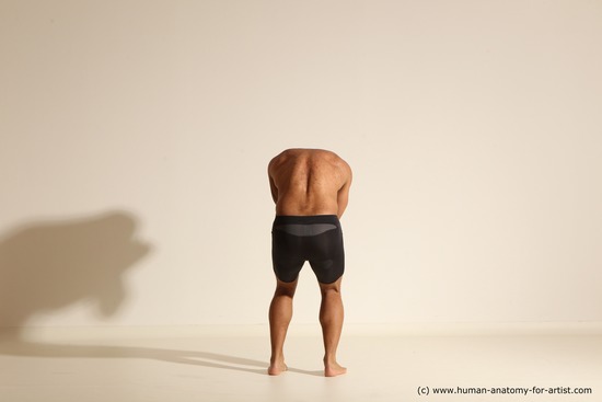 Underwear Gymnastic poses Man Black Muscular Bald Dancing Dynamic poses Academic