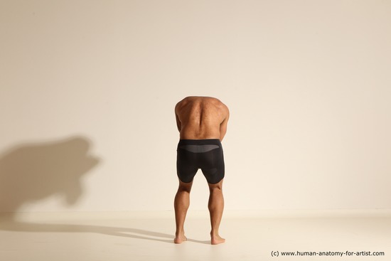 Underwear Gymnastic poses Man Black Muscular Bald Dancing Dynamic poses Academic