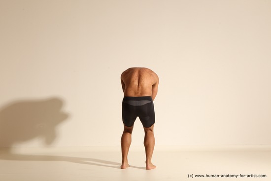 Underwear Gymnastic poses Man Black Muscular Bald Dancing Dynamic poses Academic