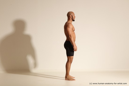 Underwear Gymnastic poses Man Black Muscular Bald Dancing Dynamic poses Academic