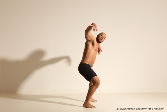 Underwear Gymnastic poses Man Black Muscular Bald Dancing Dynamic poses Academic