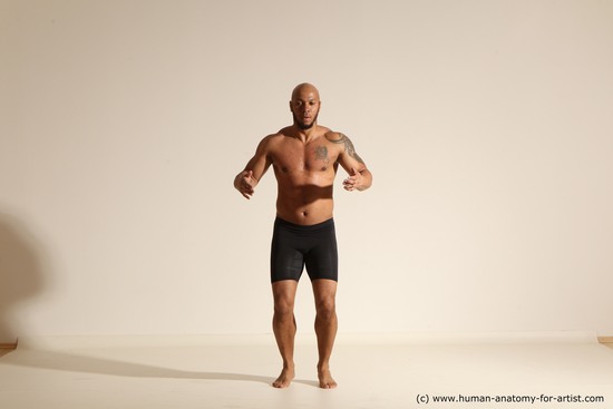 Underwear Gymnastic poses Man Black Muscular Bald Dancing Dynamic poses Academic