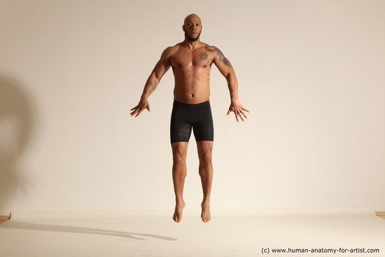 Underwear Gymnastic poses Man Black Muscular Bald Dancing Dynamic poses Academic