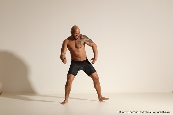 Underwear Gymnastic poses Man Black Muscular Bald Dancing Dynamic poses Academic