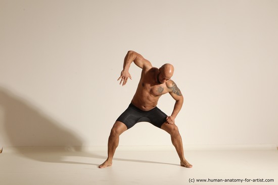 Underwear Gymnastic poses Man Black Muscular Bald Dancing Dynamic poses Academic