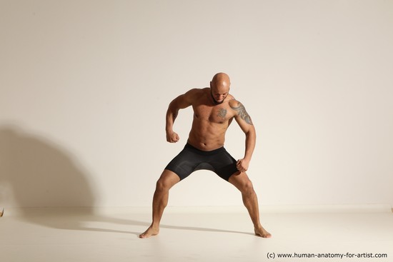 Underwear Gymnastic poses Man Black Muscular Bald Dancing Dynamic poses Academic