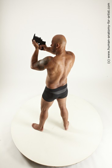 Underwear Fighting with gun Man Black Sitting poses - simple Muscular Bald Sitting poses - ALL Multi angles poses Academic