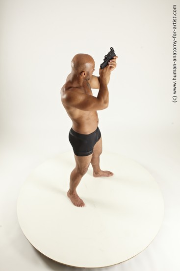 Underwear Fighting with gun Man Black Sitting poses - simple Muscular Bald Sitting poses - ALL Multi angles poses Academic