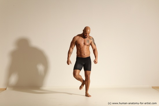 Underwear Gymnastic poses Man Black Muscular Bald Dancing Dynamic poses Academic