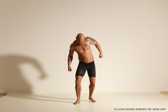 Underwear Gymnastic poses Man Black Muscular Bald Dancing Dynamic poses Academic