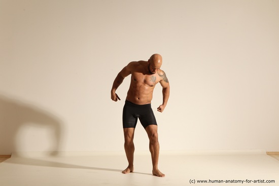 Underwear Gymnastic poses Man Black Muscular Bald Dancing Dynamic poses Academic