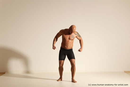 Underwear Gymnastic poses Man Black Muscular Bald Dancing Dynamic poses Academic