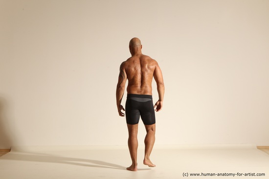 Underwear Gymnastic poses Man Black Muscular Bald Dancing Dynamic poses Academic