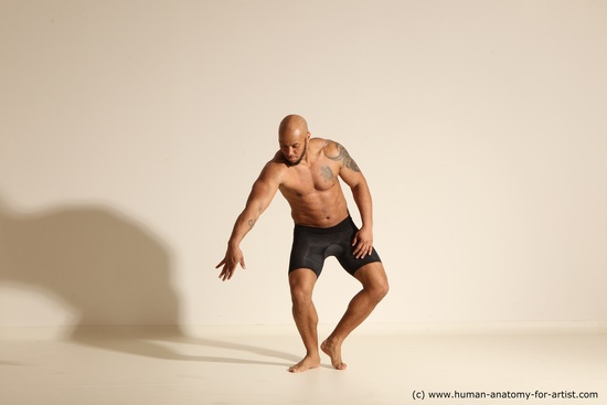 Underwear Gymnastic poses Man Black Muscular Bald Dancing Dynamic poses Academic