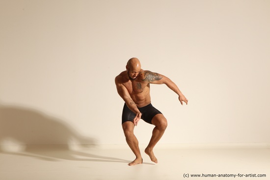 Underwear Gymnastic poses Man Black Muscular Bald Dancing Dynamic poses Academic