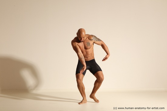 Underwear Gymnastic poses Man Black Muscular Bald Dancing Dynamic poses Academic