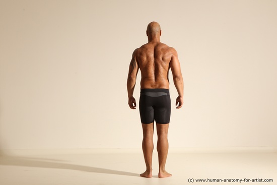 Underwear Gymnastic poses Man Black Muscular Bald Dancing Dynamic poses Academic