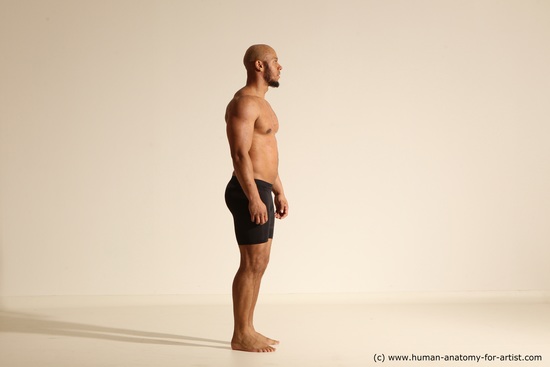 Underwear Gymnastic poses Man Black Muscular Bald Dancing Dynamic poses Academic