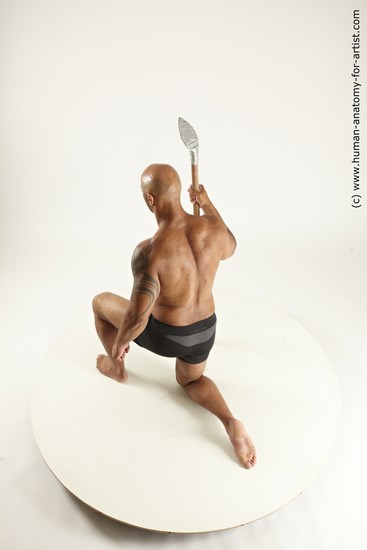 Underwear Fighting Man Black Muscular Bald Multi angles poses Academic