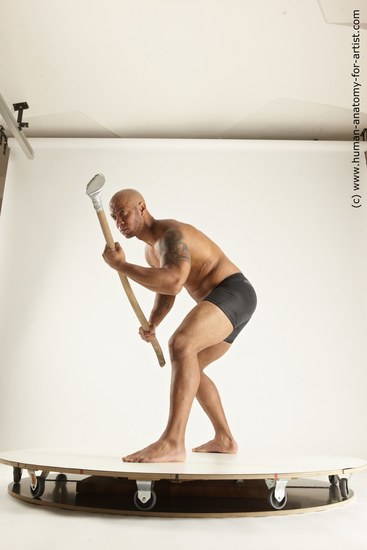 Underwear Fighting Man Black Muscular Bald Multi angles poses Academic