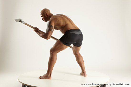 Underwear Fighting Man Black Muscular Bald Multi angles poses Academic