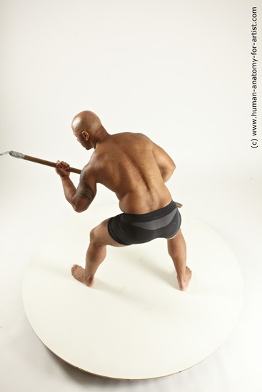 Underwear Fighting Man Black Muscular Bald Multi angles poses Academic