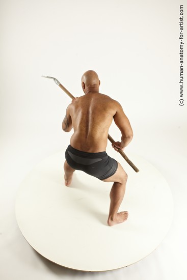 Underwear Fighting Man Black Muscular Bald Multi angles poses Academic