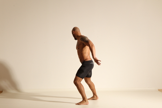 Underwear Man Black Muscular Bald Dancing Dynamic poses Academic